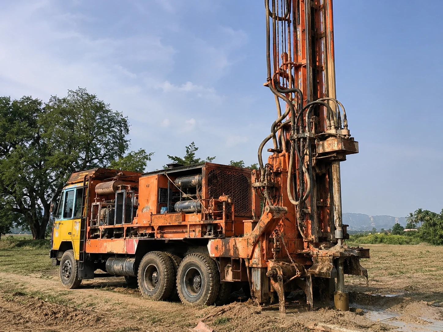Open well work vehicle and equipment at a site